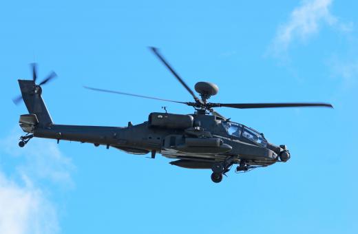 The development and construction of rotary wing aircraft such as the AH-64 Apache helicopter is part of the aerospace industry.