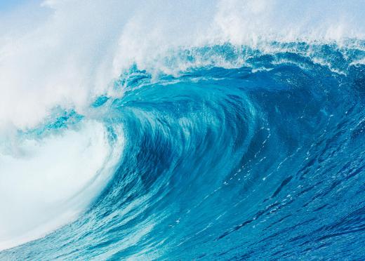 Tsunamis are usually triggered by powerful earthquakes under the ocean floor.