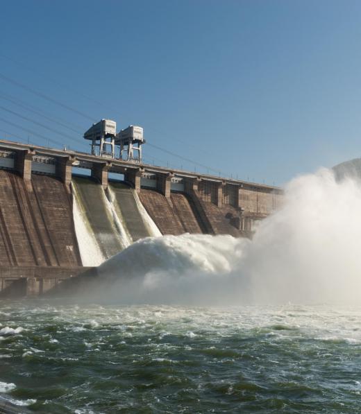 Rules of thermodynamics govern energy conversion systems, such as hydroelectric dams.