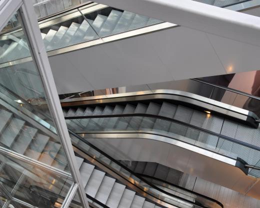 Building systems engineering can include design escalators with efficiency in mind.