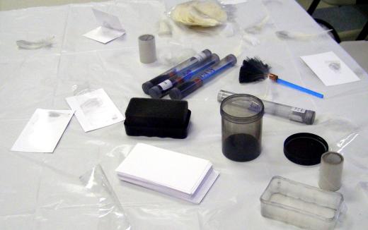 A fingerprinting kit is commonly used to examine evidence from crime scenes.