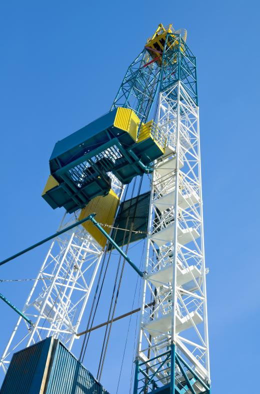 A platform covers the auger rig over a borehole.