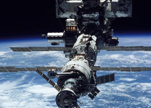 The International Space Station operates between 320 km and 347 km above Earth's surface.