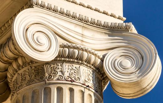 Ionic columns are characterized by their spiraled scroll designs, called volutes.