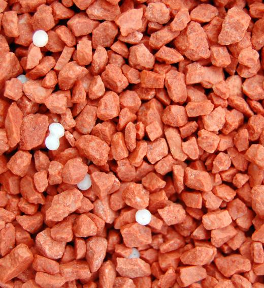 Potassium granules, which are often included in fertilizer.