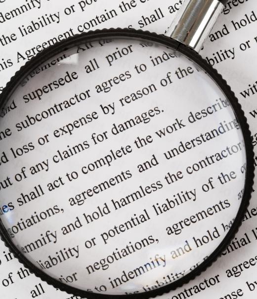 A magnifying glass may be used to read the fine print of a document.