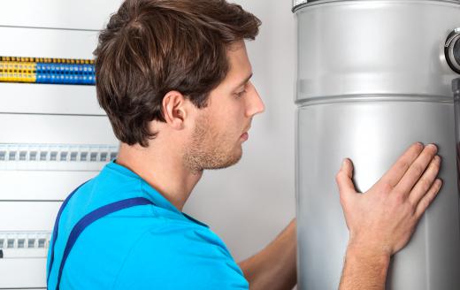 Some central heating systems use boilers to heat water or air that is then used for warming a home or building.