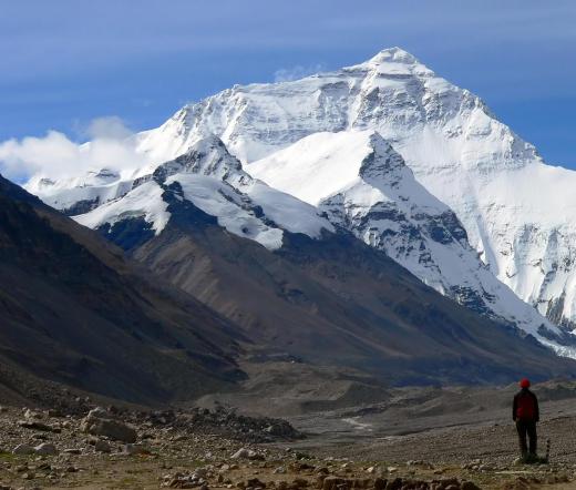 The air density at the top of Mount Everest is much lower than at sea level.