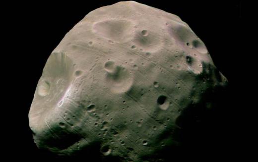 Since the orbit of Mars takes it near the Asteroid Belt, it is theorized that its moons Phobos and Deimos are captured asteroids.