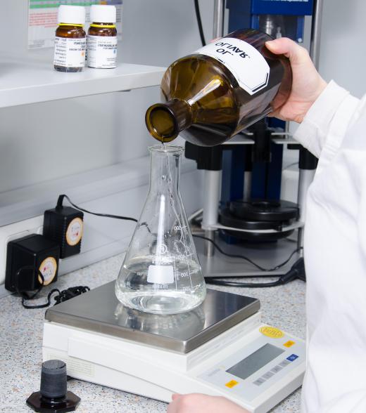 Weighing chemicals may be conducted in wet chemistry experimentation.