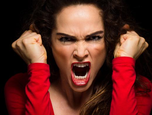 A geneticist studying a person with an anger disorder would look for inherited biological traits that could contribute to having a short temper.