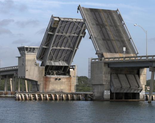 Folding bridges can be raised to allow ships to pass underneath.