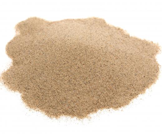 Sand grains may create sandstone in a geological process.