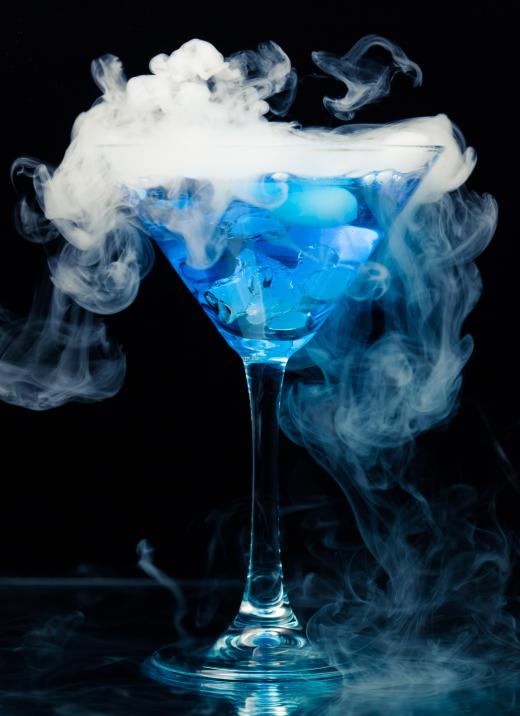 When exposed to air, dry ice immediately begins to give off a smoky carbon dioxide gas.