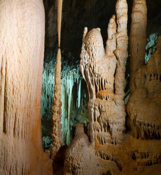 Stalagmates and stalactites form in caves as mineral-filled water drips and creates formations.