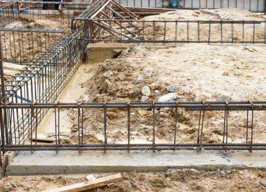 Concrete is reinforced with steel bars, or rebar, to support the weight of a building.