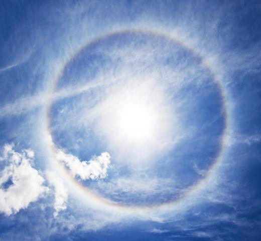 A halo is occasionally seen when the sun shines through clouds.