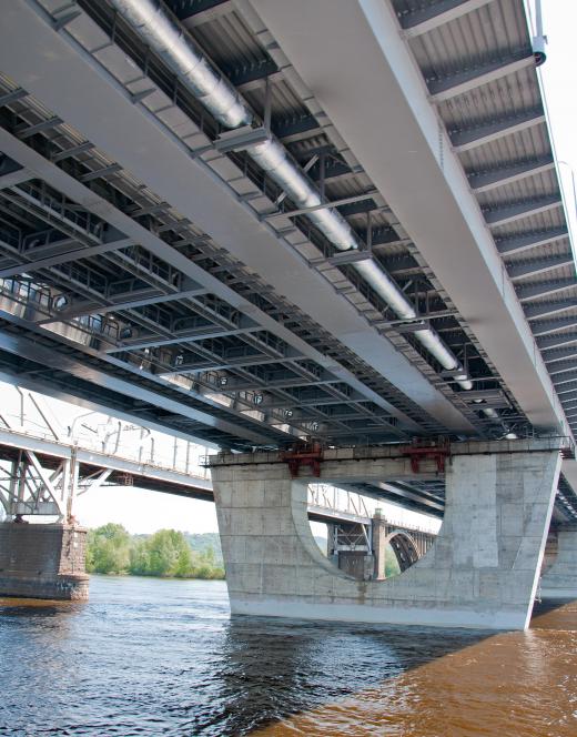 Thicker beams, such as the steel beams used in bridges, can have longer spans.