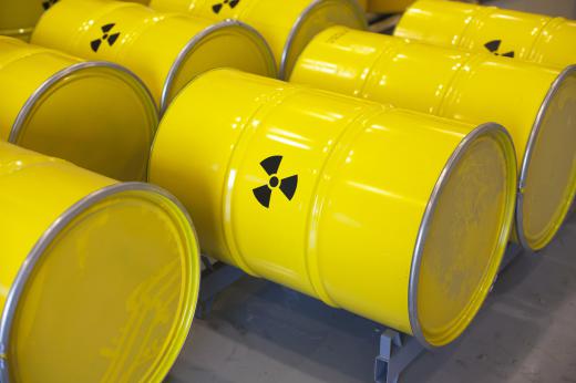 Barrels that contain uranium are stamped with the universal warning sign for radioactivity.