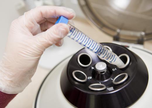 Geneticists often use a centrifuge to split different components of a DNA sample.